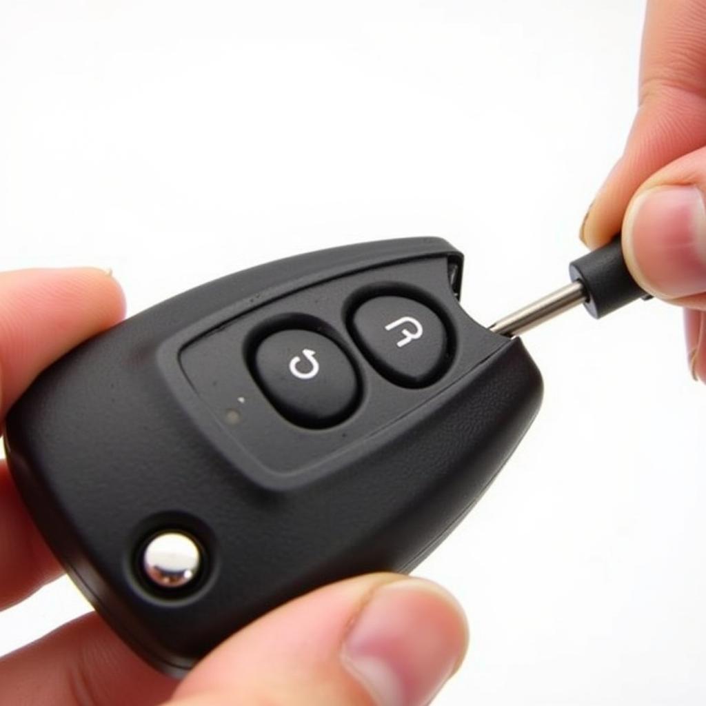 Opening Buick Encore Key Fob with Screwdriver