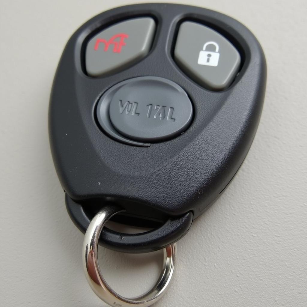 2007 Ford Escape Key Fob with Auto Start Button Highlighted