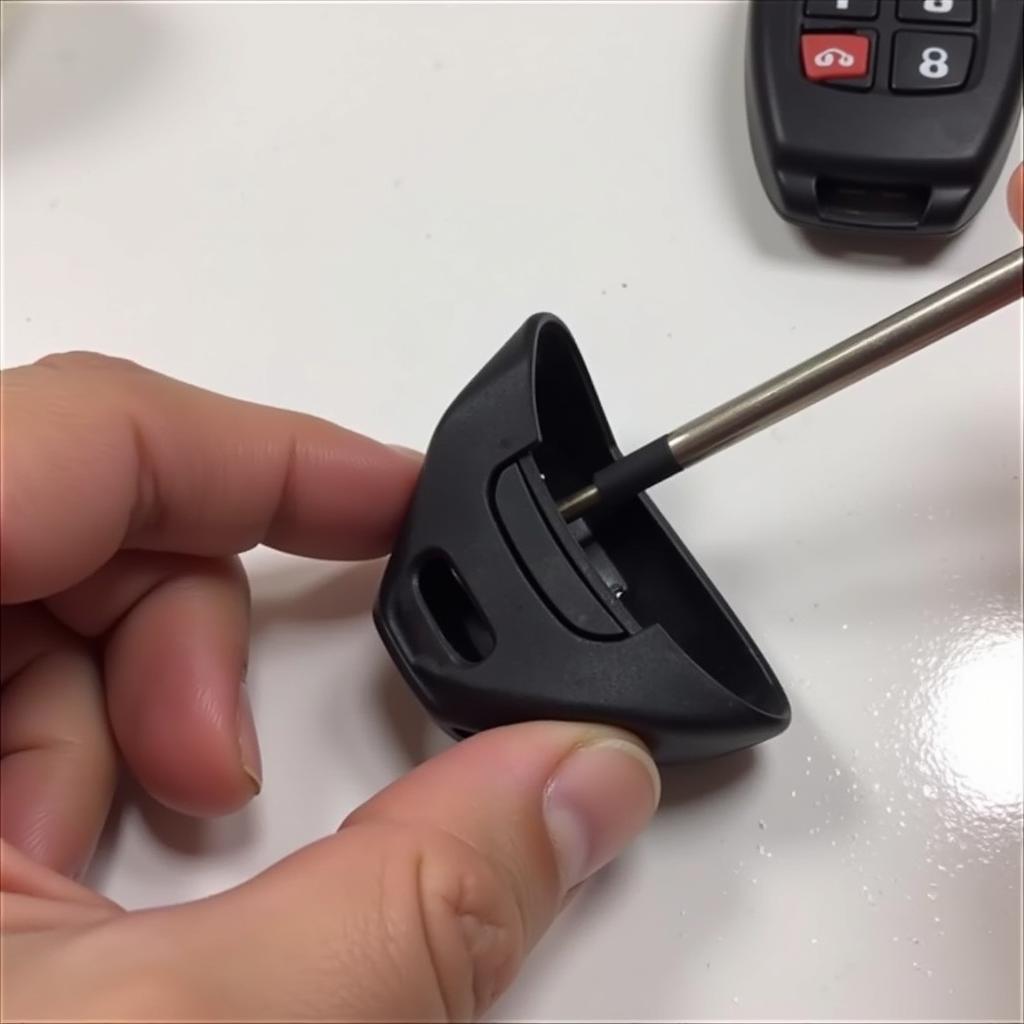 Opening the 2010 Jeep Commander Key Fob