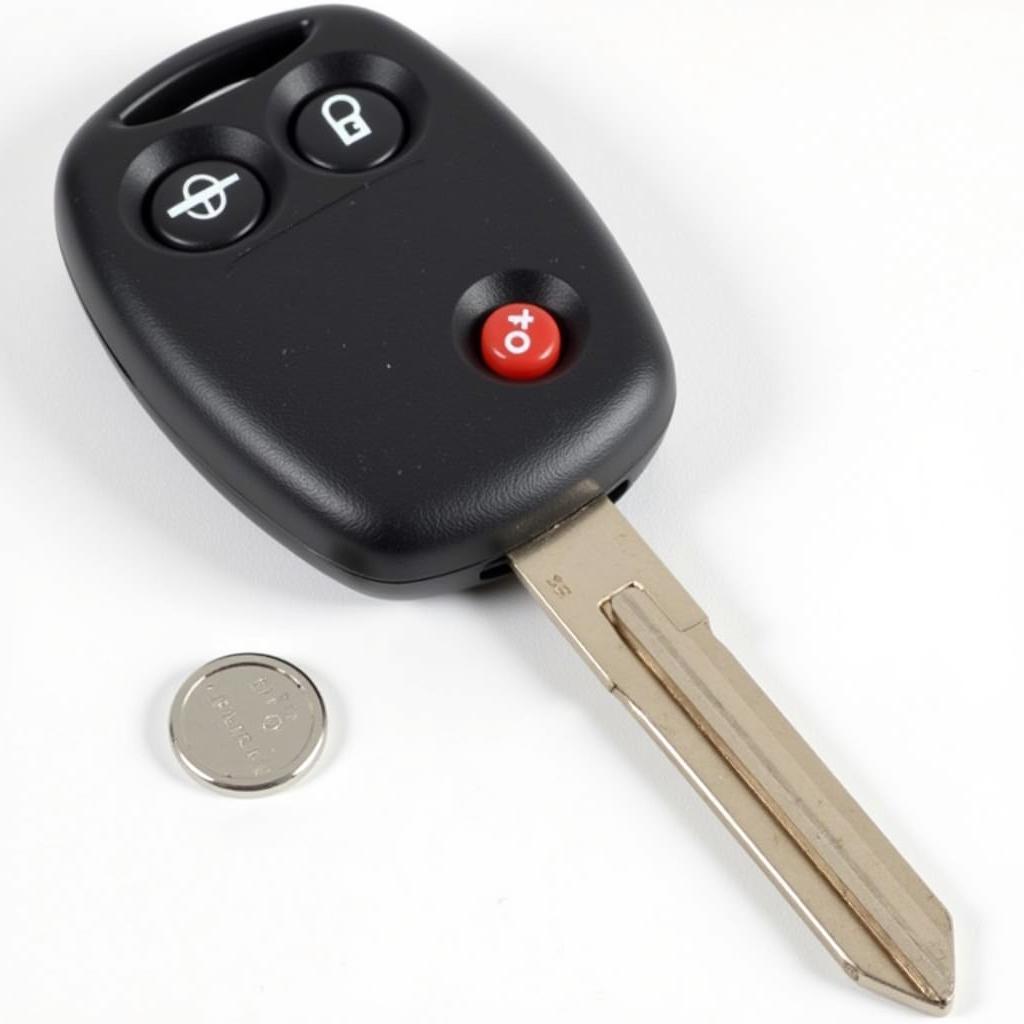 2013 Chevy Malibu Key Fob Battery - CR2032 Battery Close-up and Key Fob