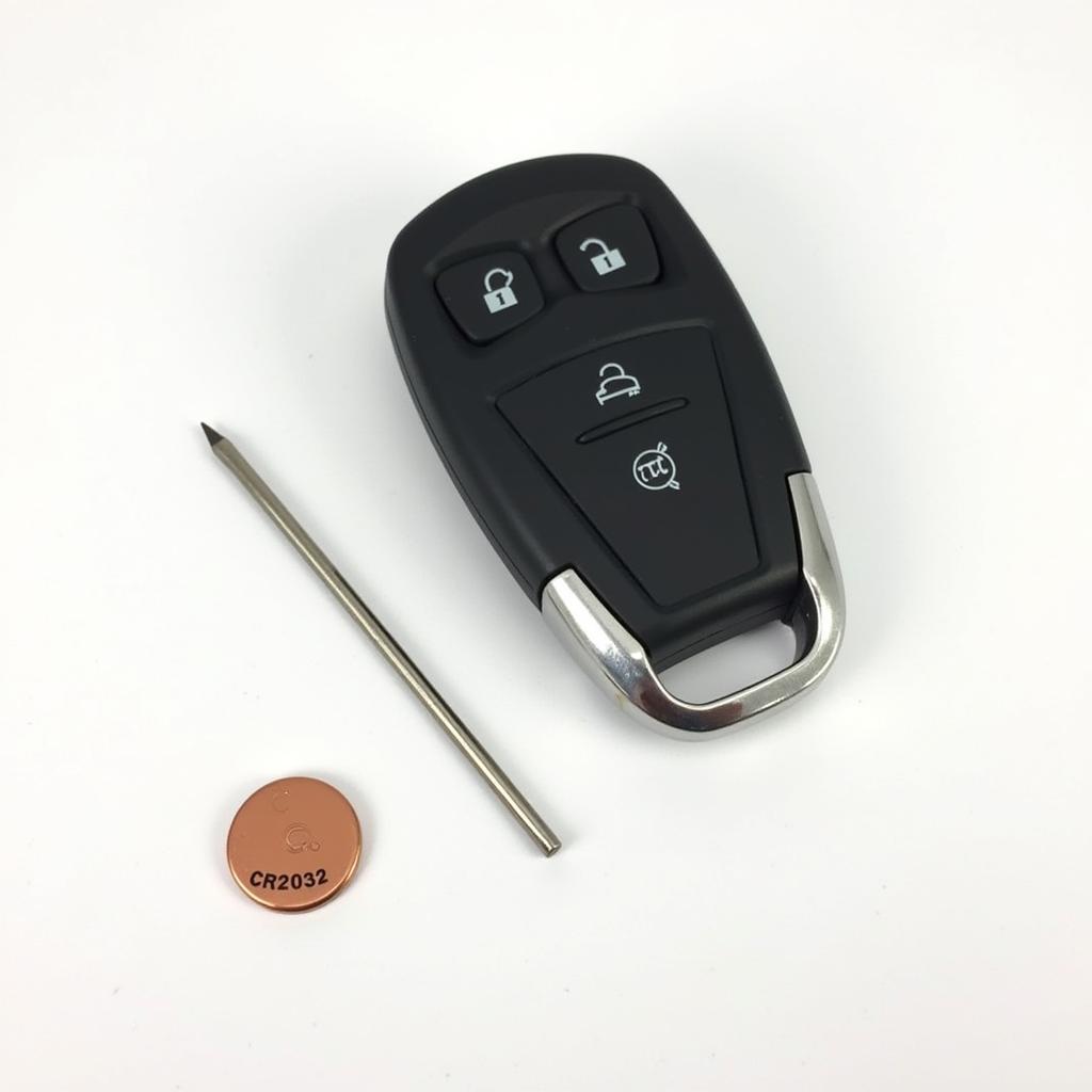 2013 Volvo Key Fob Battery Replacement Tools: Flathead Screwdriver and CR2032 Battery