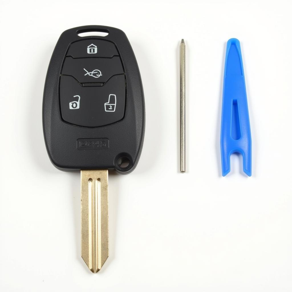 2014 Nissan Frontier key fob opening tools: Flathead screwdriver and plastic pry tool.