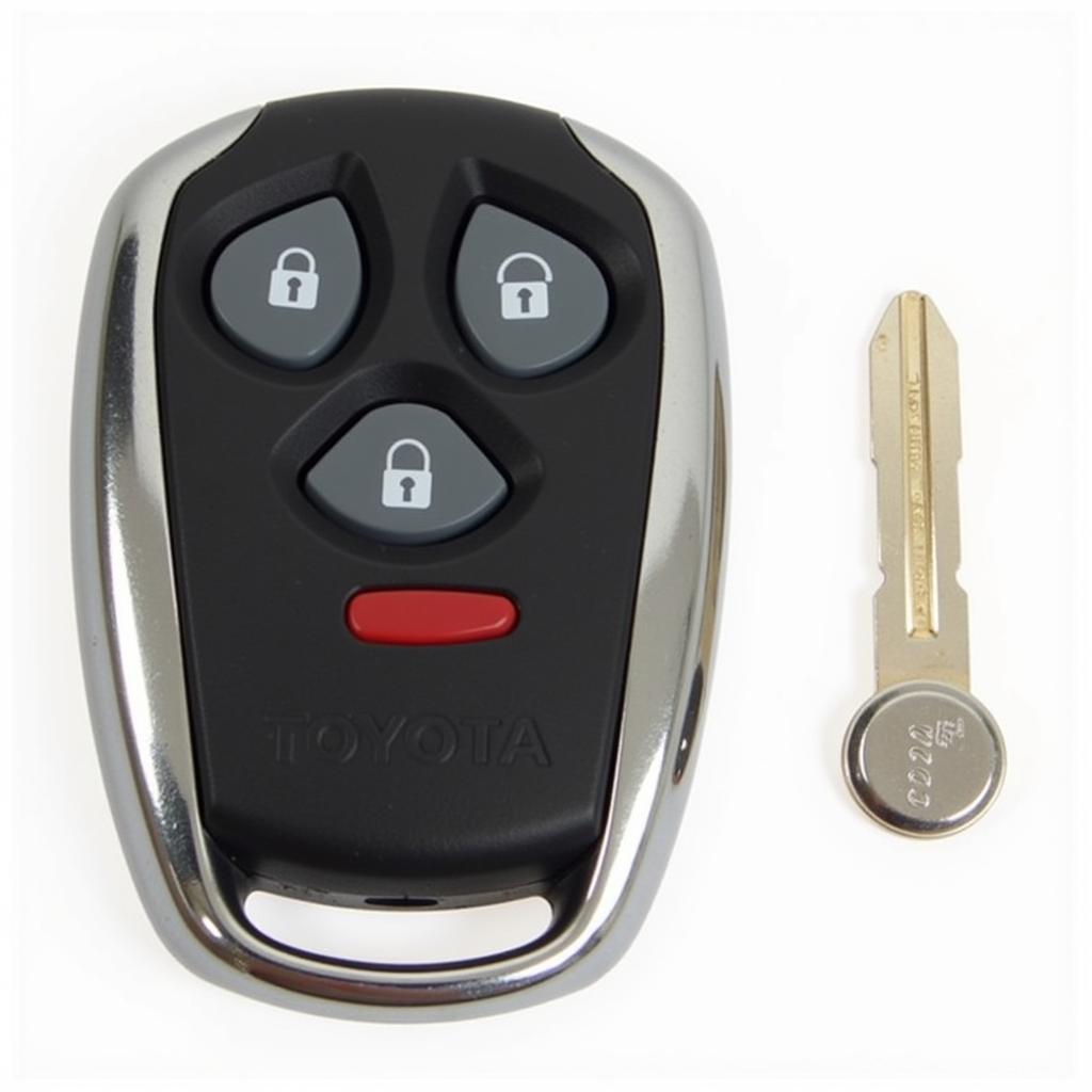 2015 Toyota Camry Key Fob Battery CR2032: Close-up of a CR2032 battery next to a 2015 Toyota Camry key fob.