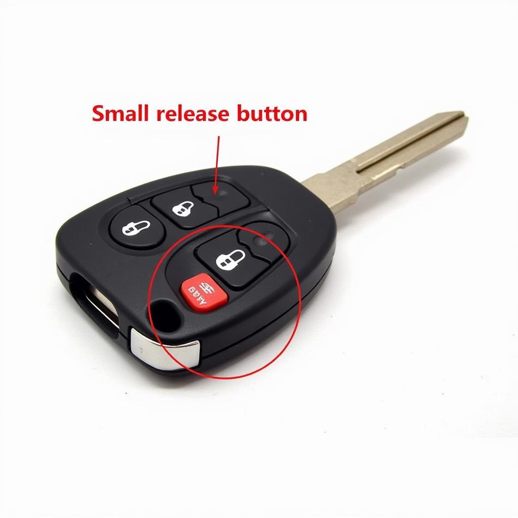 Close-up of a Chevy Impala key fob highlighting the release button