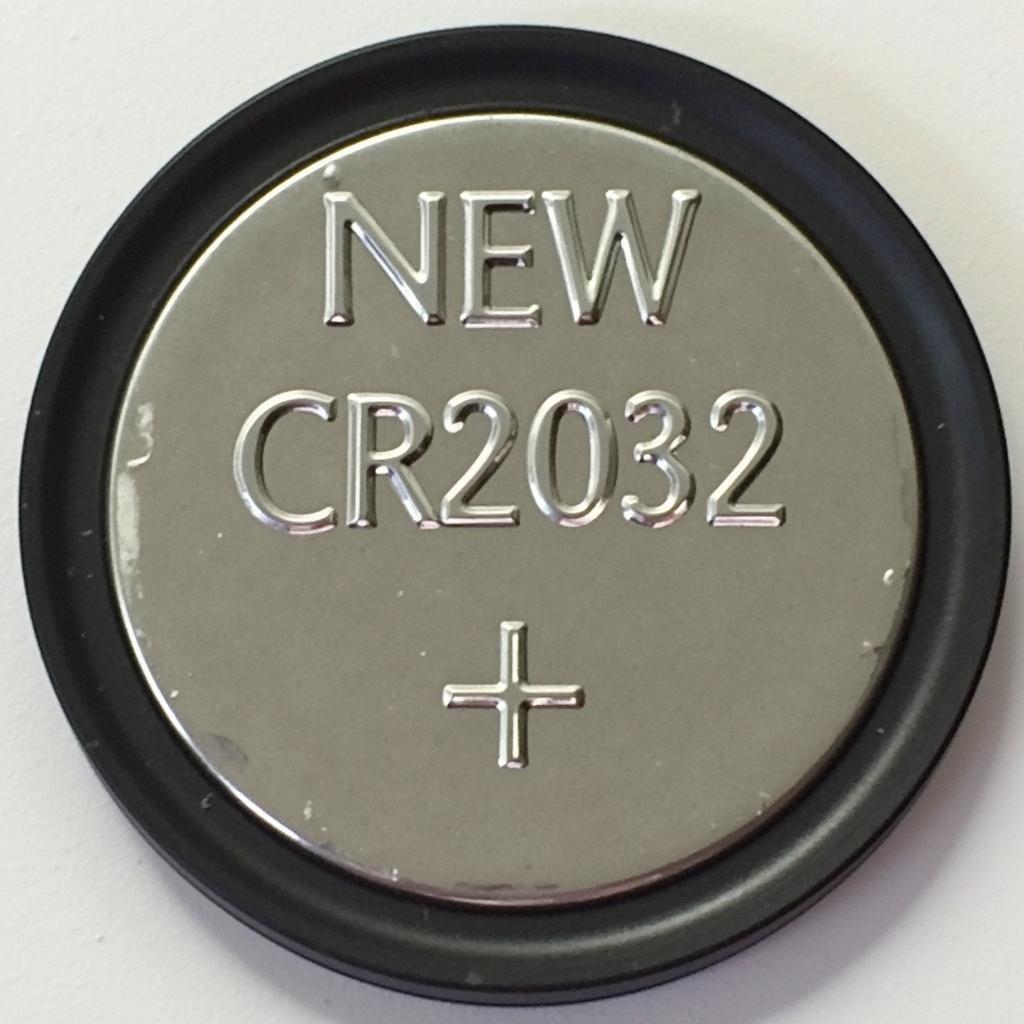 A new CR2032 battery for replacing the key fob battery