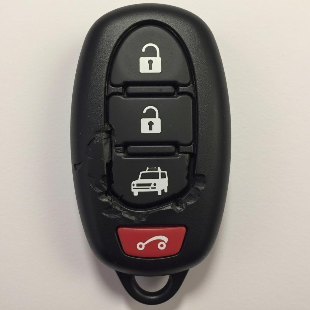 A damaged Nissan Sentra key fob