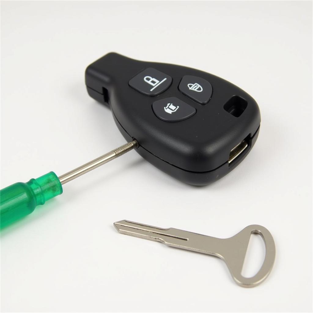 Ford Escape Key Fob Opening Tools: Screwdriver and Specialized Tool