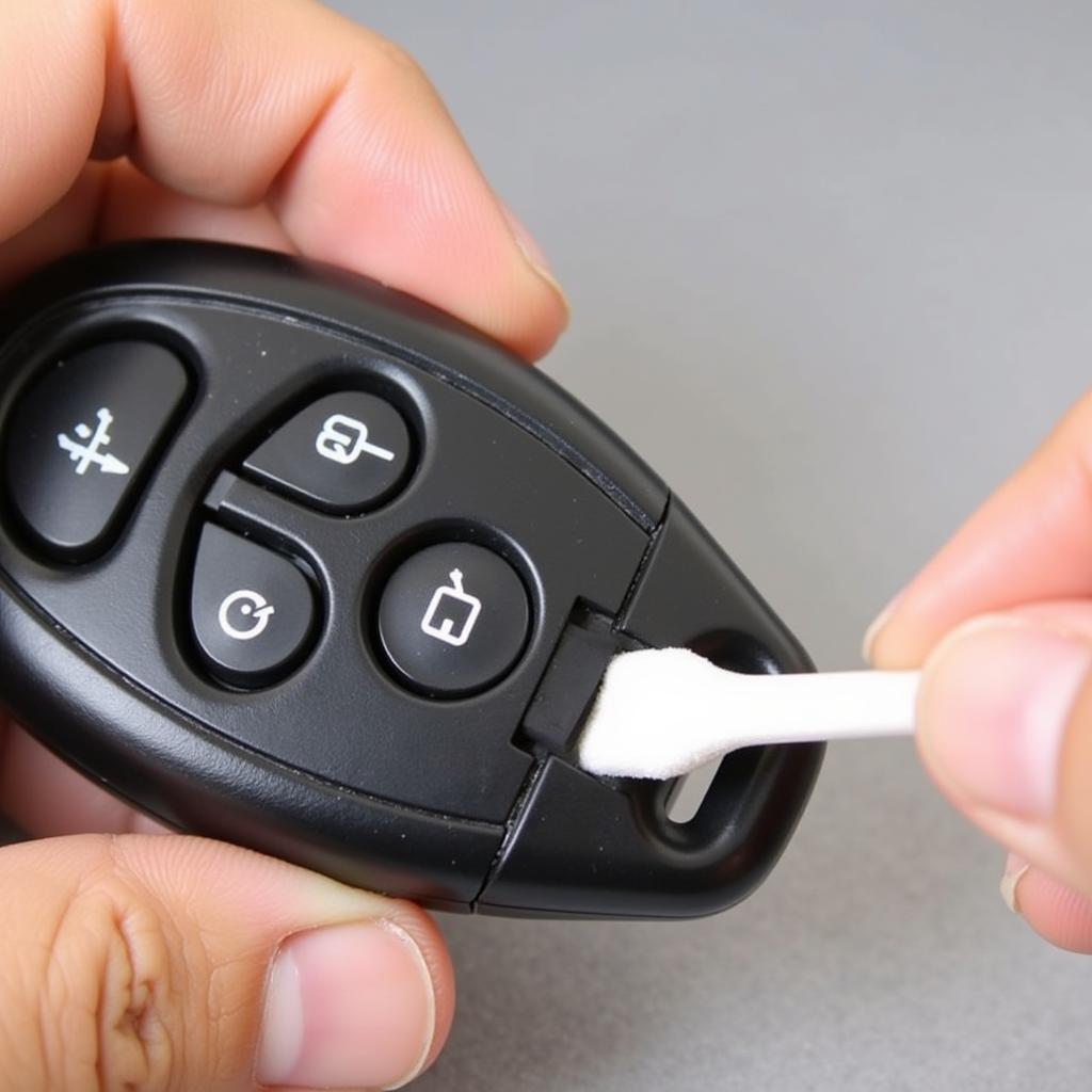 Troubleshooting 2012 Toyota Camry Key Fob Issues: Cleaning Battery Contacts