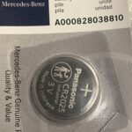 Mercedes-Benz branded key fob battery packaging, highlighting the official parts.