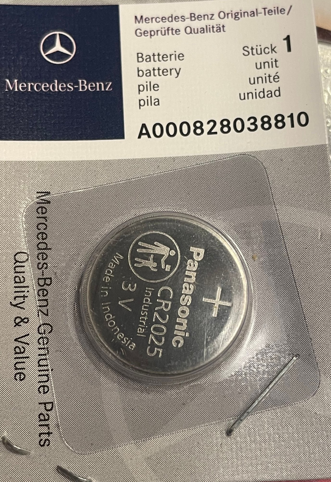 Mercedes-Benz branded key fob battery packaging, highlighting the official parts.