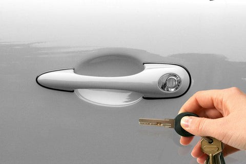 Opening a car door with a traditional key fob remote.