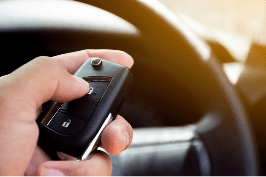 Locate the program button inside the transmitter compartment of your Toyota