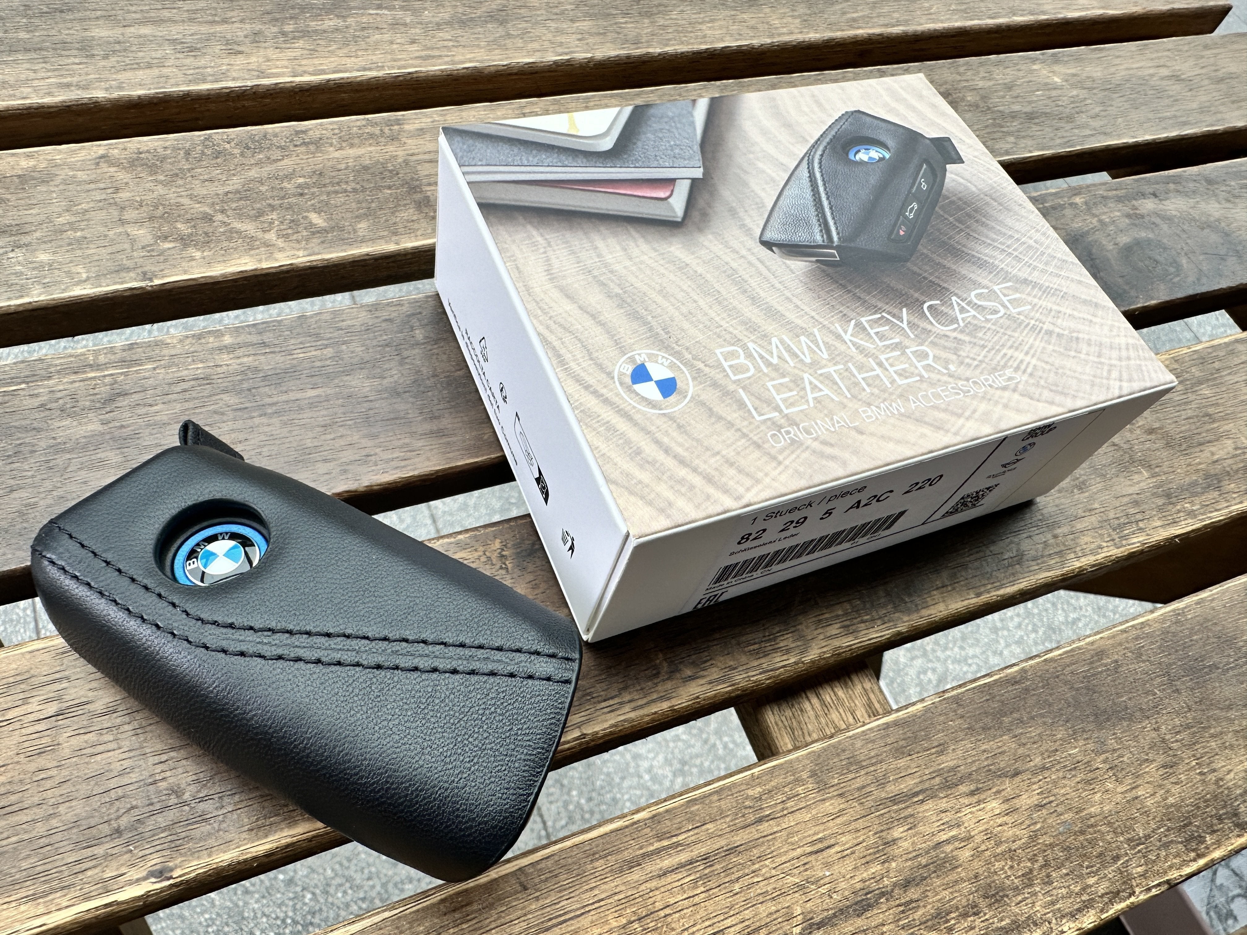 Close-up of Nappa leather key fob case for BMW Ix showing premium leather texture and stitching