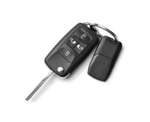 A close-up image of a car key fob showcasing its buttons and design, relevant to starting a car without it