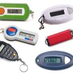 Various types of physical security tokens including key fobs, smart cards and proximity cards used for keyless entry systems in vehicles and buildings.