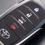 Toyota key fob and tools for battery replacement