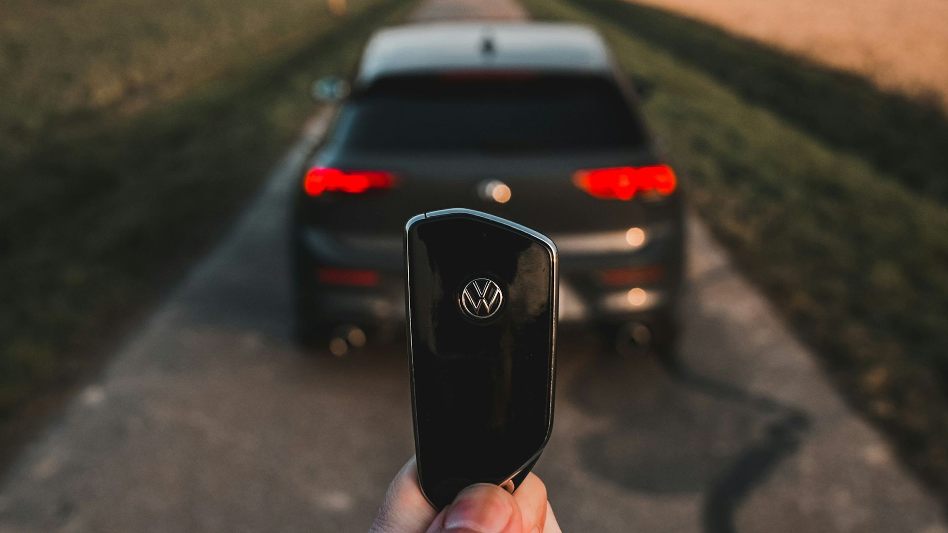 Volkswagen car key with remote lock and unlock buttons